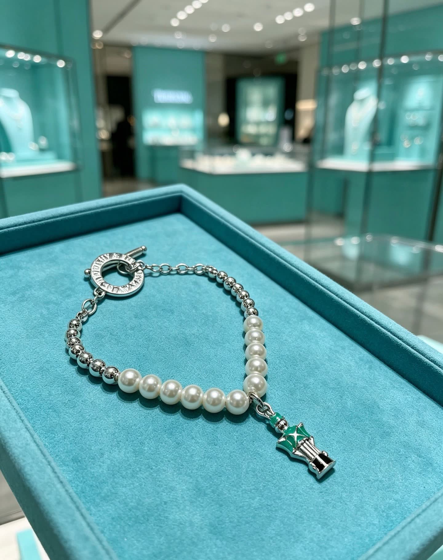 Tiffany & Co. Pearl and Bead Bracelet with Green Enamel Charm